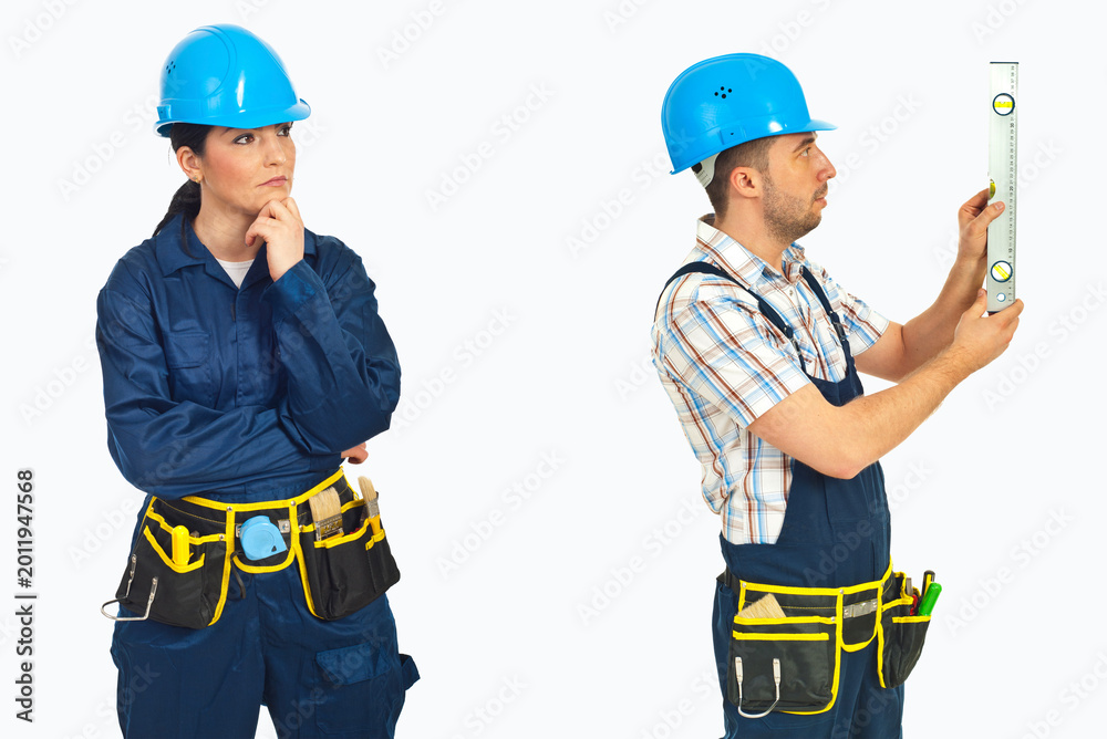 Fototapeta premium Worker holds level, checking height