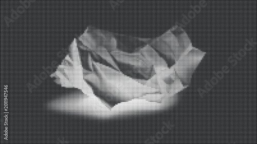 Vászonkép Crinkled paper lit from within on a dark transparent background