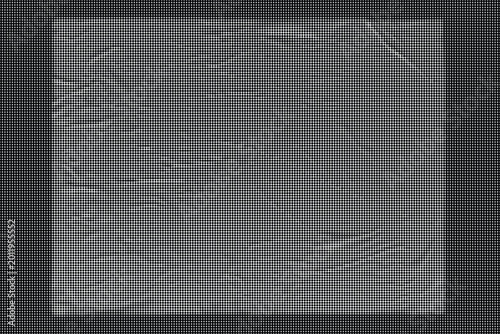 Photos A gray wrinkled sheet on a flat surface with creases and folds