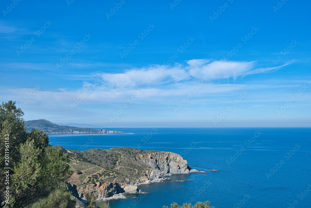 Ταπετσαρία Scenic coastal landscape with terraced hillsides overlooking the deep blue Mediterranean