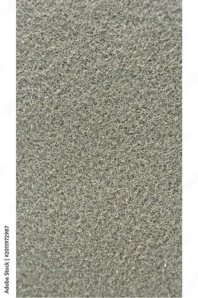 Fototapeta premium Gray sand texture fills the frame completely with uniform small grains creating a neutral and minimalist background perfect for creative design work, product display, or text overlays in professional.