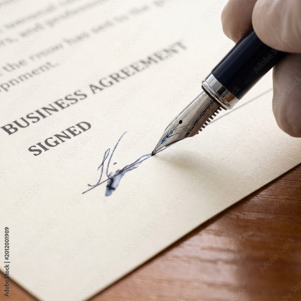 Fototapeta premium Pen signing contract on paper in close up studio lighting business agreement