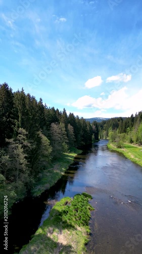 Drone flight over Regen river near Regen town in Bavarian Forest landscape in Lower Bavaria Germany