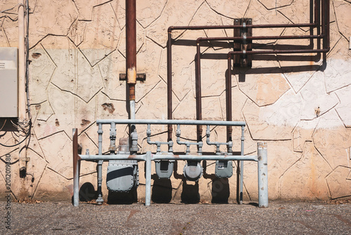 Foto Utility meters in rundown urban alley