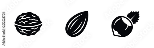 Foto Minimalist black silhouette icons of a walnut, almond, and hazelnut with a leaf, isolated on a white background