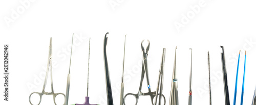 Photos Microsurgical instrument set for neurosurgery and spinal procedures on white background