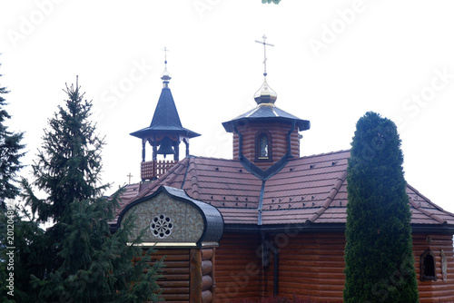 Schilderij op canvas Rustic Wooden Monastery with Traditional Orthodox Domes