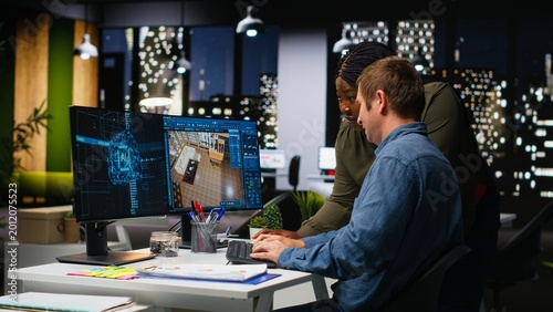 Photos Diverse team of engineers using artificial intelligence to design a floor plan, working together with neural networks and computer aided apartment layout on architectural software