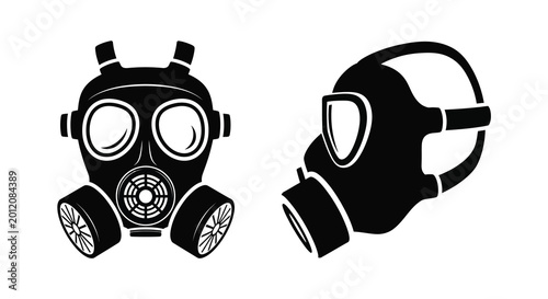 Foto Two vintage gas masks depicted in a stark black silhouette