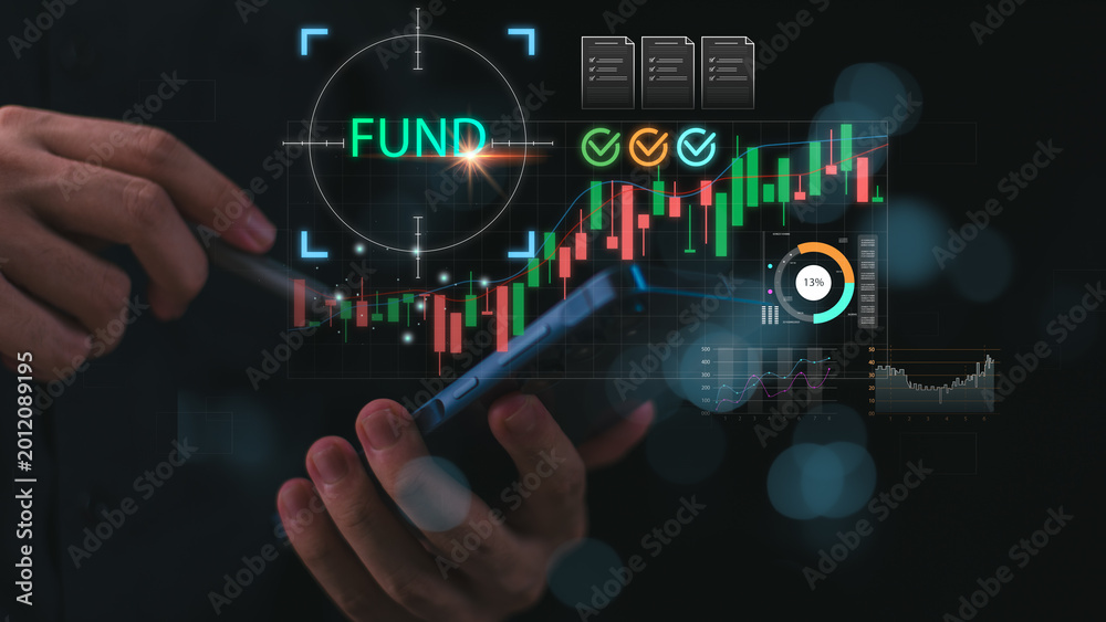 Fototapeta premium Financial investors monitor fund performance and financial market trends through digital analytics, portfolio tracking, investment research, growth forecasting, and strategic asset management.