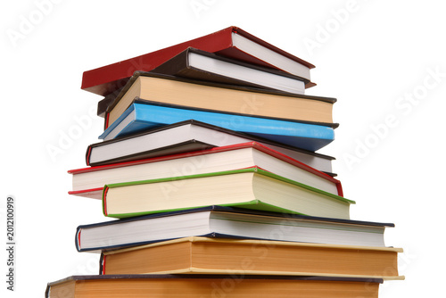Foto Isolated towering stack of colorful hardcover books symbolizing education and wi