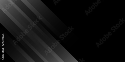 Minimalist black background with soft diagonal geometric shapes, creating a sleek and professional visual concept.