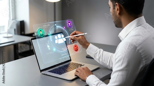 Professional engaging with innovative holographic user interface projected from a laptop, demonstrating advanced augmented reality and future digital interaction in a modern office setting