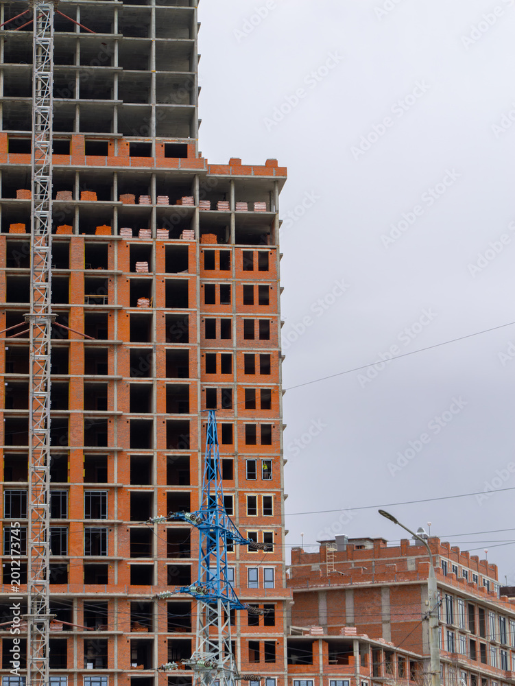 Obraz premium Tall Urban Tower Under Construction