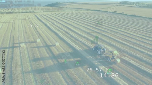 HUD activating, blue tractor moving along rows, making bales and showing CO water for precision ag