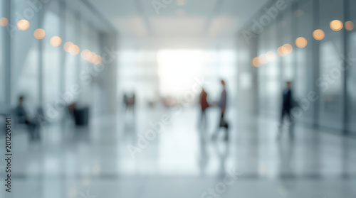 Blurred office lobby people walking with soft light and calm atmosphere