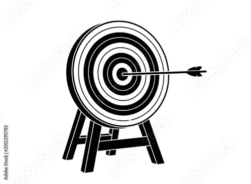 Archery target with arrow in the center bullseye