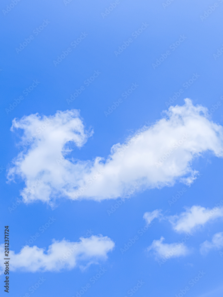 Fototapeta premium Beautiful, bright, cloudy blue sky background with many clouds, sunny weather during daytime in hot summer