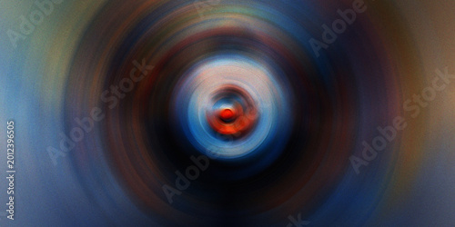 Tablou pe pânză Vibrant circular gradient featuring radial light blur motion effects creating deep blue and orange artistic center focal point