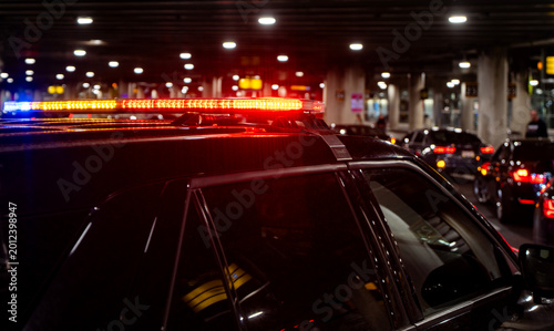 Canvas Print Police car with flashing red blue lights