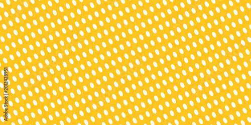White dot in yellow seamless pattern background. Retro dotted textile texture design