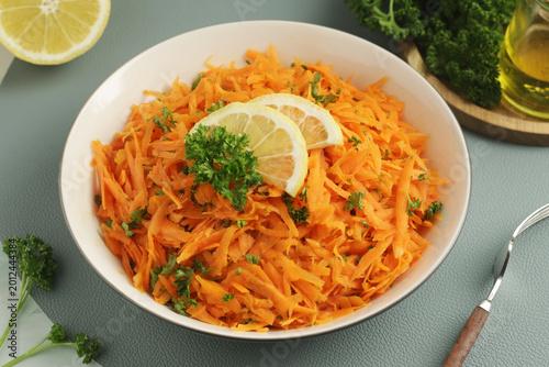 Photography Salad Carrotes rapees - traditional French dish made of carrots
