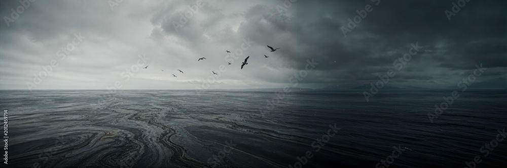 Obraz premium Stormy polluted ocean landscape with dark contaminated water and birds, environmental disaster website banner wide format, marine ecology crisis concept.