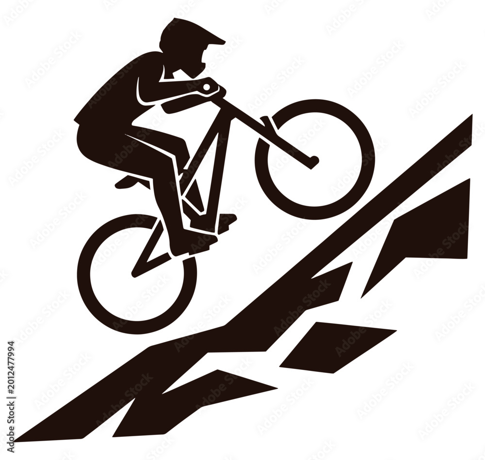 Fototapeta premium Man riding a bicycle down a ramp performing a stunt trick on a bike