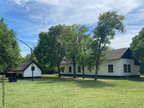 Traditional Hungarian Farmhouse with Shadoof
