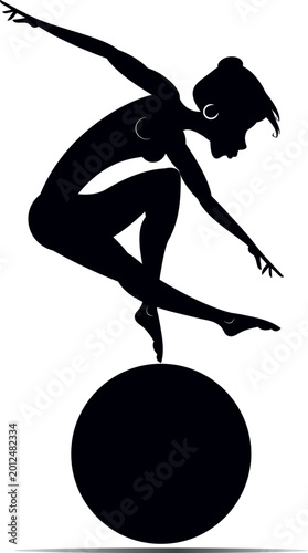 Young woman balances on a ball
Fitness. Beautiful female doing exercises with fitness ball. Black on white
