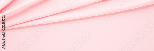 Obraz na płótnie Pastel pink soft wrinkled gabardine elastane fabric background