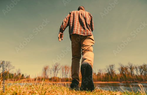 man walking in the field