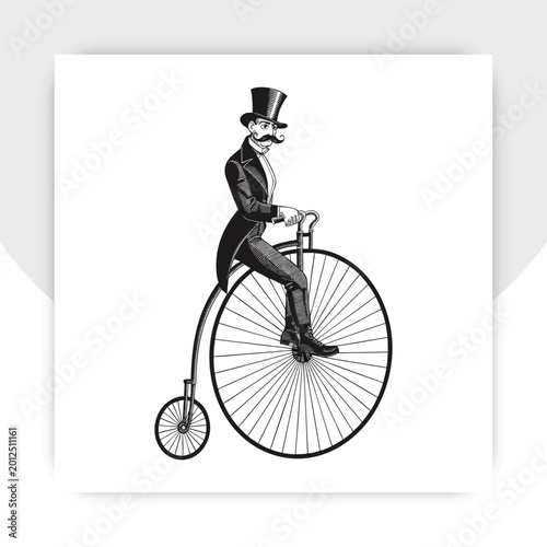 Fotografie Vintage silhouette of a gentleman riding a penny farthing bicycle classic transp