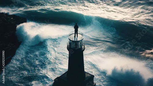 Person Standing on Lighthouse Above Stormy Ocean Cinematic Coastal Scene