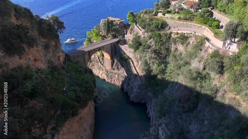 Aerial Shot of Fiordo di Furore, Fjord of Furore. Azure Water, Cliffs, Big Canyon, famous bridge in Amalfi coast, Italy
