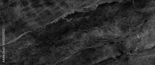 Black marble stone texture. Dark abstract background.