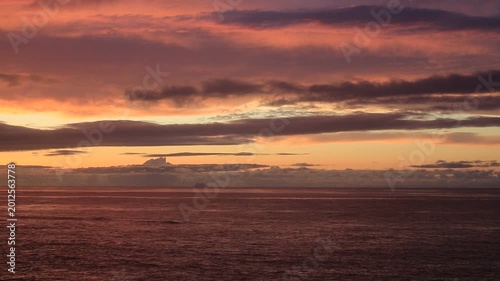 Sunset over the East China Sea with rocky coast in Amami Oshima, Japan