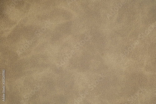 Fotografia Close up of a light brown suede surface showing its fine texture for backgrounds