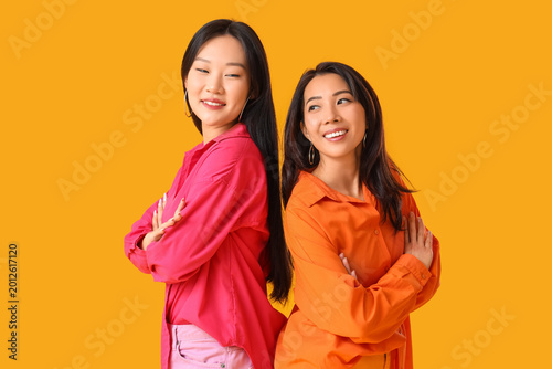 Beautiful young happy Asian...