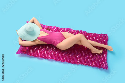 Female tourist with hat lyi...