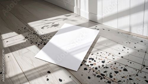 Blank Paper on Tiled Floor.