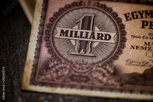 фотографія The denomination design of a Hungarian 1 milliard pengo banknote from 1946, showing bold numeral artwork, ornate print texture, aged paper, and historic hyperinflation currency details