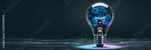 Innovation technology concept with a light bulb and blue gears mechanism for an engineering solution on a dark background