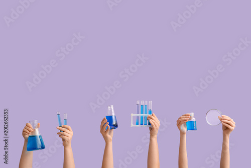 Female hands holding filled...