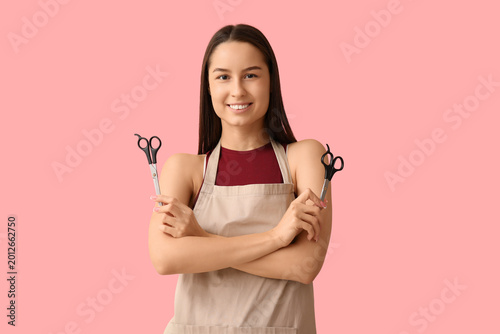 Female hairdresser with sci...