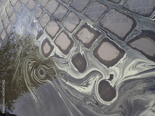dust ans oil stain on water pound