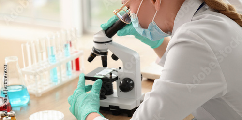 Female scientist with medic...
