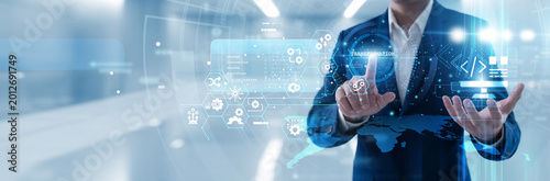Photos Transformation expert hand touching transformation icon on virtual screen to modernize legacy systems, optimize corporate workflows and lead digital evolution for a future-ready enterprise
