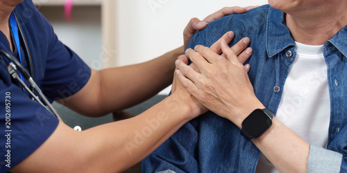 Asian healthcare worker showing empathy and support to senior patient