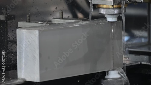 The video of wire EDM machine cutting through high thickness metal material with high precision.